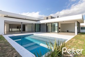 Casa em Condomínio à venda com 434m², 4 dormitórios, 4 suítes, 6 vagas, no bairro Terra Ville em PORTO ALEGRE
