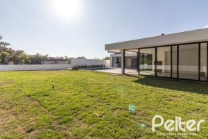 Casa em Condomínio à venda com 434m², 4 dormitórios, 4 suítes, 6 vagas, no bairro Terra Ville em PORTO ALEGRE
