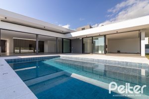 Casa em Condomínio à venda com 434m², 4 dormitórios, 4 suítes, 6 vagas, no bairro Terra Ville em PORTO ALEGRE