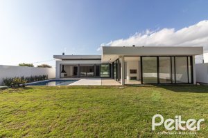 Casa em Condomínio à venda com 434m², 4 dormitórios, 4 suítes, 6 vagas, no bairro Terra Ville em PORTO ALEGRE