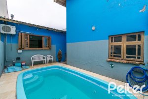 Casa à venda com 160m², 3 dormitórios, 1 suíte, 4 vagas, no bairro Ipanema / Imperial Parque em Porto Alegre
