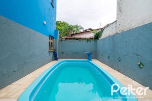 Casa à venda com 160m², 3 dormitórios, 1 suíte, 4 vagas, no bairro Ipanema / Imperial Parque em Porto Alegre