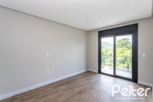 Casa em Condomínio à venda com 380m², 4 dormitórios, 4 suítes, 3 vagas, no bairro Alphaville em PORTO ALEGRE