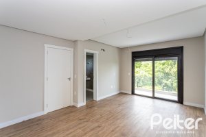 Casa em Condomínio à venda com 380m², 4 dormitórios, 4 suítes, 3 vagas, no bairro Alphaville em PORTO ALEGRE