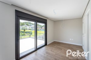 Casa em Condomínio à venda com 380m², 4 dormitórios, 4 suítes, 3 vagas, no bairro Alphaville em PORTO ALEGRE