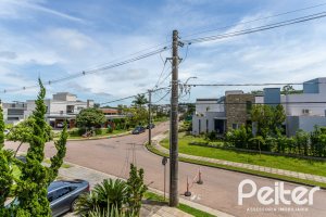 Casa em Condomínio à venda com 380m², 4 dormitórios, 4 suítes, 3 vagas, no bairro Alphaville em PORTO ALEGRE