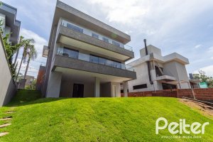 Casa em Condomínio à venda com 380m², 4 dormitórios, 4 suítes, 3 vagas, no bairro Alphaville em PORTO ALEGRE