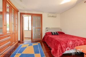 Casa em Condomínio à venda com 609m², 6 dormitórios, 2 suítes, 3 vagas, no bairro Cavalhada em PORTO ALEGRE