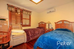 Casa em Condomínio à venda com 609m², 6 dormitórios, 2 suítes, 3 vagas, no bairro Cavalhada em PORTO ALEGRE