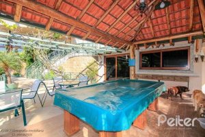 Casa em Condomínio à venda com 609m², 6 dormitórios, 2 suítes, 3 vagas, no bairro Cavalhada em PORTO ALEGRE