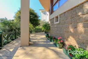 Casa em Condomínio à venda com 609m², 6 dormitórios, 2 suítes, 3 vagas, no bairro Cavalhada em PORTO ALEGRE