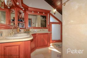 Casa em Condomínio à venda com 609m², 6 dormitórios, 2 suítes, 3 vagas, no bairro Cavalhada em PORTO ALEGRE