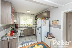 Casa em Condomínio à venda com 223m², 3 dormitórios, 1 suíte, 2 vagas, no bairro Jardim Isabel em Porto Alegre