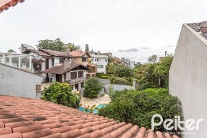 Casa em Condomínio à venda com 223m², 3 dormitórios, 1 suíte, 2 vagas, no bairro Jardim Isabel em Porto Alegre