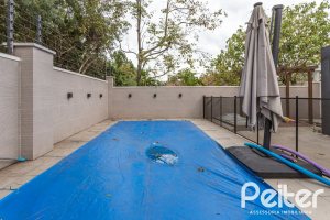 Casa em Condomínio à venda com 242m², 3 dormitórios, 3 suítes, 4 vagas, no bairro Mountain Ville em PORTO ALEGRE