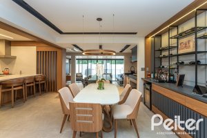 Casa em Condomínio à venda com 242m², 3 dormitórios, 3 suítes, 4 vagas, no bairro Mountain Ville em PORTO ALEGRE