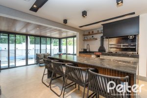 Casa em Condomínio à venda com 242m², 3 dormitórios, 3 suítes, 4 vagas, no bairro Mountain Ville em PORTO ALEGRE