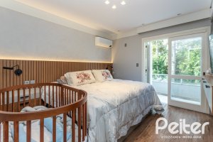 Casa em Condomínio à venda com 242m², 3 dormitórios, 3 suítes, 4 vagas, no bairro Mountain Ville em PORTO ALEGRE