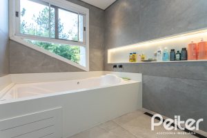 Casa em Condomínio à venda com 242m², 3 dormitórios, 3 suítes, 4 vagas, no bairro Mountain Ville em PORTO ALEGRE