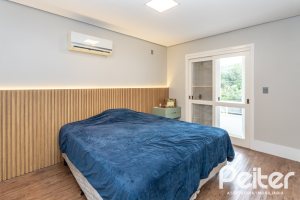 Casa em Condomínio à venda com 242m², 3 dormitórios, 3 suítes, 4 vagas, no bairro Mountain Ville em PORTO ALEGRE