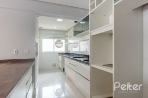 Apartamento à venda com 102m², 3 dormitórios, 1 suíte, 2 vagas, no bairro Tristeza em Porto Alegre