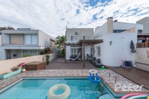 Casa em Condomínio à venda com 178m², 4 dormitórios, 2 suítes, 2 vagas, no bairro Mountain Ville em PORTO ALEGRE