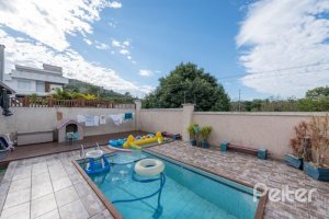 Casa em Condomínio à venda com 178m², 4 dormitórios, 2 suítes, 2 vagas, no bairro Mountain Ville em PORTO ALEGRE