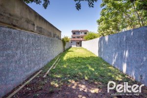 Casa à venda com 186m², 3 dormitórios, 3 suítes, 2 vagas, no bairro Espírito Santo em Porto Alegre