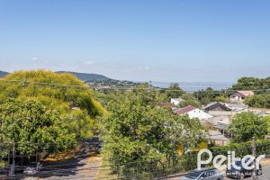 Casa à venda com 186m², 3 dormitórios, 3 suítes, 2 vagas, no bairro Espírito Santo em Porto Alegre