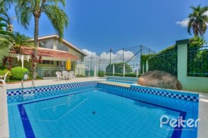 Casa em Condomínio à venda com 208m², 3 dormitórios, 1 suíte, 2 vagas, no bairro Tristeza em PORTO ALEGRE