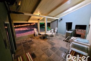 Casa à venda com 350m², 3 dormitórios, 1 suíte, 4 vagas, no bairro Vila Assuncao em Porto Alegre