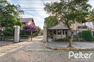 Casa em Condomínio à venda com 245m², 3 dormitórios, 1 suíte, 2 vagas, no bairro Tristeza em PORTO ALEGRE