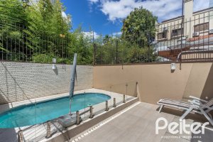 Casa à venda com 272m², 3 dormitórios, 1 suíte, 4 vagas, no bairro Tristeza em Porto Alegre