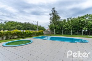 Casa em Condomínio à venda com 108m², 3 dormitórios, 2 suítes, 2 vagas, no bairro Hípica em PORTO ALEGRE