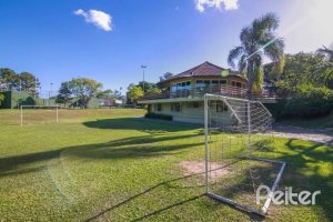 Casa em Condomínio à venda com 299m², 3 dormitórios, 1 suíte, 4 vagas, no bairro Cavalhada em PORTO ALEGRE
