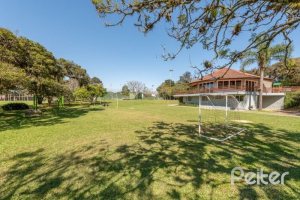Casa em Condomínio à venda com 299m², 3 dormitórios, 1 suíte, 4 vagas, no bairro Cavalhada em PORTO ALEGRE