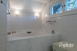 Casa em Condomínio à venda com 817m², 5 dormitórios, 5 suítes, 8 vagas, no bairro Terra Ville em PORTO ALEGRE