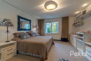 Casa em Condomínio à venda com 817m², 5 dormitórios, 5 suítes, 8 vagas, no bairro Terra Ville em PORTO ALEGRE