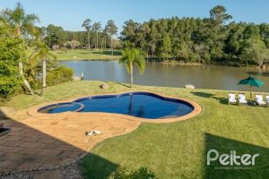 Casa em Condomínio à venda com 817m², 5 dormitórios, 5 suítes, 8 vagas, no bairro Terra Ville em PORTO ALEGRE