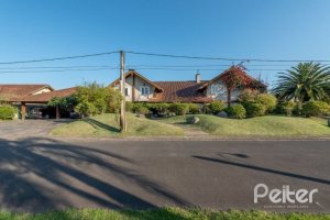 Casa em Condomínio à venda com 817m², 5 dormitórios, 5 suítes, 8 vagas, no bairro Terra Ville em PORTO ALEGRE