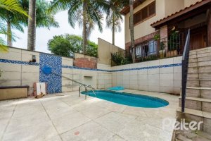 Casa em Condomínio à venda com 166m², 3 dormitórios, 1 suíte, 1 vaga, no bairro Jardim Isabel em Porto Alegre