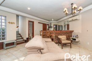 Casa em Condomínio à venda com 166m², 3 dormitórios, 1 suíte, 1 vaga, no bairro Jardim Isabel em Porto Alegre