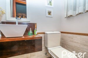 Casa em Condomínio à venda com 166m², 3 dormitórios, 1 suíte, 1 vaga, no bairro Jardim Isabel em Porto Alegre