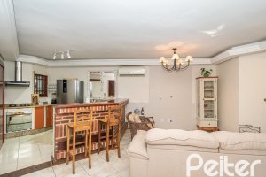 Casa em Condomínio à venda com 166m², 3 dormitórios, 1 suíte, 1 vaga, no bairro Jardim Isabel em Porto Alegre