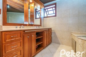 Casa em Condomínio à venda com 166m², 3 dormitórios, 1 suíte, 1 vaga, no bairro Jardim Isabel em Porto Alegre