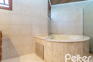 Casa em Condomínio à venda com 166m², 3 dormitórios, 1 suíte, 1 vaga, no bairro Jardim Isabel em Porto Alegre