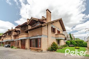 Casa em Condomínio à venda com 206m², 3 dormitórios, 1 suíte, 2 vagas, no bairro Tristeza em Porto Alegre