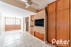 Casa em Condomínio à venda com 206m², 3 dormitórios, 1 suíte, 2 vagas, no bairro Tristeza em Porto Alegre