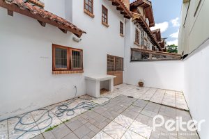 Casa em Condomínio à venda com 206m², 3 dormitórios, 1 suíte, 2 vagas, no bairro Tristeza em Porto Alegre