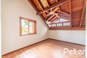 Casa em Condomínio à venda com 206m², 3 dormitórios, 1 suíte, 2 vagas, no bairro Tristeza em Porto Alegre